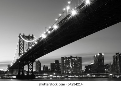 New York City Skyline And Manhattan Bridge At Night