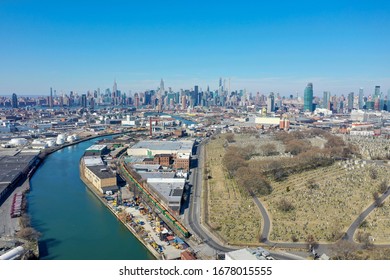 New York City skyline from Newtown Creek by the Kosciuszko Bridge.