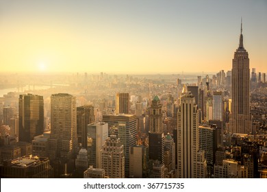 New York City skyline with urban skyscrapers at gentle sunrise, famous Manhattan view, USA