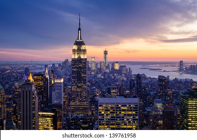 New York City with skyscrapers at sunset - Shutterstock ID 139761958