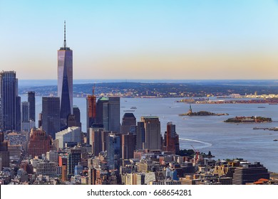 New York City south view at sunrise with morning mist