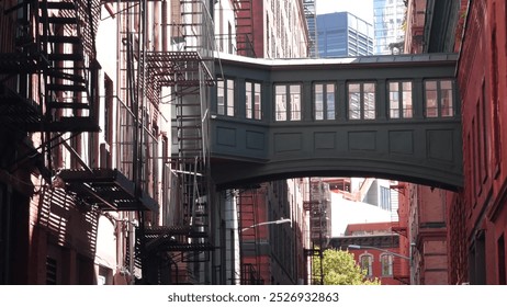 New York City Staple street skybridge. Vintage retro industrial architecture, red brick building. American old historic cooper elevated sky bridge Manhattan landmark, USA. Fire escape ladder. - Powered by Shutterstock