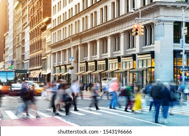New York City street scene with crowds of diverse people in motion through a busy intersection on 5th Avenue in Midtown Manhattan NYC - Shutterstock ID 1543196666