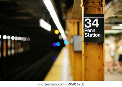 New York City subway sign with a blurry background