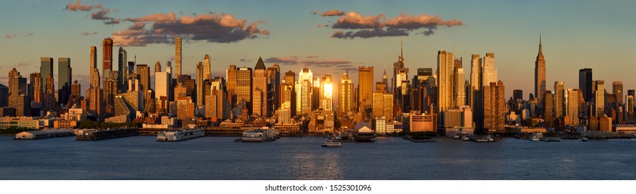 New York City Sunset On Midtown West And Its Skyscrapers. Panoramic View On Manhattan And The Hudson River Banks