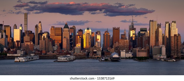 New York City Sunset On Midtown West Skyscrapers. Panoramic View On Manhattan And The Hudson River Banks. NY, USA