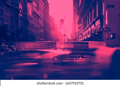 New York City taxi cabs speeding through Midtown Manhattan with pink and blue duotone color effect