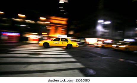 New York City Taxi On A Night Street. Motion Shot.