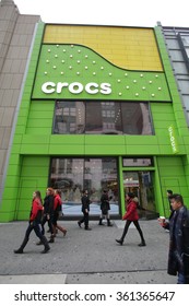 NEW YORK CITY - THURSDAY, DECEMBER 31, 2015: Pedestrians Walk Past The Flagship Retail Store For Shoe Manufacturer Crocs, Inc.