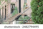 New York City townhouse building, Brooklyn Heights residential district, USA. Brownstone urban architecture, attached house. United States real estate, american property, apartments and homes in NYC.