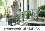 New York City townhouse building, Brooklyn Heights residential district, USA. Brownstone urban architecture, attached house. United States real estate, american property, apartments and homes in NYC.