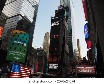 New York City, New York United States - August 29 2021: Spotify Justin Quiles Black Billboard Album Advertisement In Times Square With Logo.