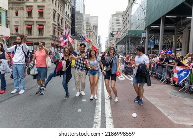 NEW YORK CITY, UNITED STATES - Jun 13, 2022: The Large Crowd Celebrating Puerto Rican Day Parade 2022 On The Streets Of New York City, USA