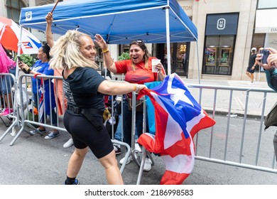 NEW YORK CITY, UNITED STATES - Jun 13, 2022: The Large Crowd Celebrating Puerto Rican Day Parade 2022 On The Streets Of New York City, USA