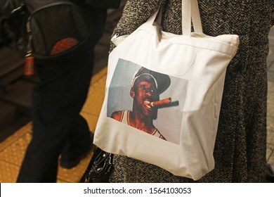 NEW YORK CITY / USA - 10 FEBRUARY 2016: Woman With Michael Jordan Smoking Cigar Bag In Subway Station