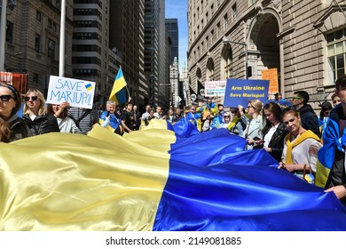 NEW YORK CITY, USA - 23 APRIL 2022: Ukrainian Citizens Protests On Wall Street Against The War After Russia Started The Invasion Of Ukraine.