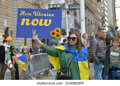 NEW YORK CITY, USA - 23 APRIL 2022: Ukrainian Citizens Protests On Wall Street Against The War After Russia Started The Invasion Of Ukraine.