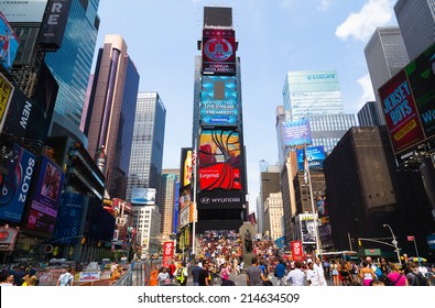 NEW YORK CITY, USA - 31ST AUGUST 2014: Time Square During The Day Showing Large Amounts Of People And Led Billboards