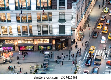 New York City, USA - April 6, 2018: High Angle Aerial View Of Macy's Store Corner In NYC Herald Square Midtown With Crowd Of People And Traffic Cars At Night