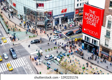 New York City, USA - April 7, 2018: Aerial High Angle View Of Urban Building In NYC Herald Square Midtown With Red Macy's Store, Verizon And HM