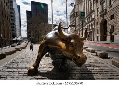 New York City, New York / USA - April 6, 2020: Wall Street Stock Exchange Metal Bull In NYC Manhattan, Lower Financial District Downtown, Closeup Of Face, Empty Street At Coronavirus Pandemic NYC