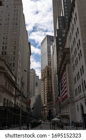 New York City, New York / USA - April 6 2020: Empty Wall Street Buildings Skyscrapers With Cherry Blossom, Empty World Trade Center, Stock Exchange Stairs During Coronavirus Pandemic In NYC