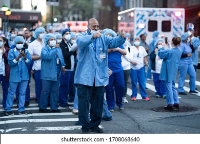 New York City, New York / USA - April 19 2020: Nurses Celebrate Conquer Of Covid19 In New York City Streets At 7 Pm. 