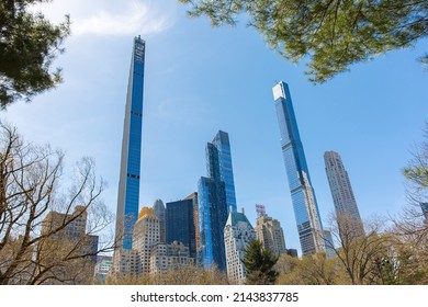 New York City, USA - April 2nd 2022: Steinway Tower With Central Park Tower And Other Buildings At Manhattan.  Low Angle View From Central Park.