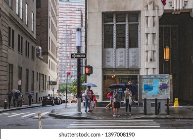 New York City, USA - Aug. 11, 2018: Pedestrians Waiting On Sidewalk To Cross The Street In A Raining Day In Lower Manhattan