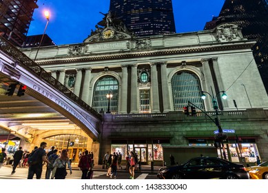 New York City, USA - August 1, 2018: Facade Of The Grand Central Terminal, Commuter Rail Terminal, At Night With People Around Located In Midtown Manhattan, New York City, USA