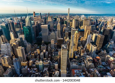 New York City, USA - August 1, 2018: Elevated view of the skyline of modern skyscrapers of Manhattan at sunset in New York City, USA - Shutterstock ID 1442003048