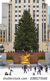 NEW YORK CITY, USA - DEC 1, 2021:  Ice-skating rink and Rockefeller Center Christmas Tree