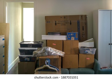 New York City USA - December 30 2020: Packed Household Stuff In Cardboard Boxes, Cleaning Things For Moving Into A New Home