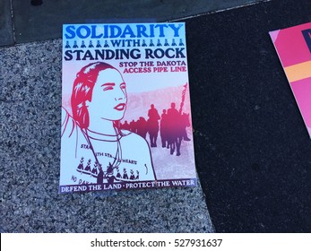 New York City, USA - December 2, 2016. Standing Rock Protesters gather in front of the United States Courthouse in solidarity with Native Americans blocking construction of the Dakota Access Pipeline.
