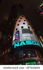 NEW YORK CITY, USA – JULE 13, 2013: Times Square On A Summer Rainy Night. View On NASDAQ MarketSite Building.