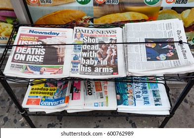 New York City, Usa - July 12, 2015: Various Newspapers For Sale In The Street In Manhattan. Mastheads Are Newsday, Daily News, The New York Times And Others.