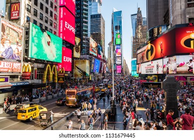 New York City, USA - June 20, 2018: Scenic View Of Times Square With A Crowd Of People And LED Billboards In Buildings