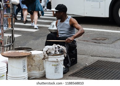 New York City, USA - June 22, 2018: Black Man Playing Drums In New York City Street