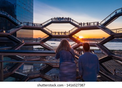 New York City, USA - June 3, 2019: The Vessel Is The Public  Space And Centerpiece Of The Hudson Yards On The West Side Of Manhattan; Comprised Of 154 Intricately Interconnecting Flights Of Stairs.