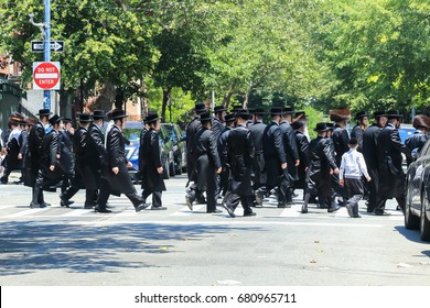 New York City, USA - June 10, 2017: Orthodox Jews Wearing Special Clothes on Shabbat, in Williamsburg, Brooklyn, New York