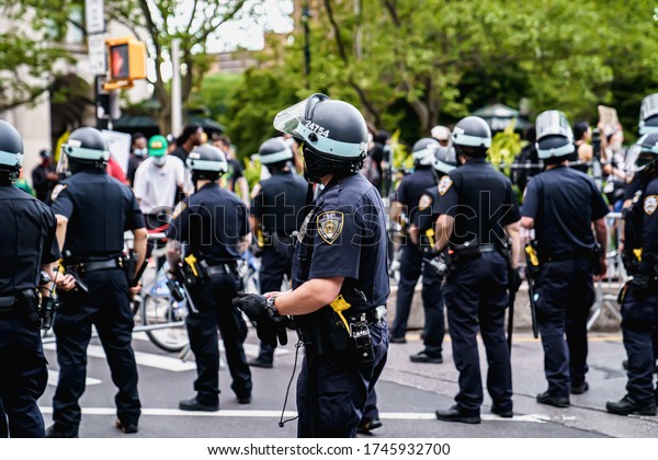 New York City, New York / USA - June 1 2020.\
Protests and looting in New York. Looting and rioting protests New\
York City over George Floy death. Police and protesters in\
Manhattan. Police\
brutality.