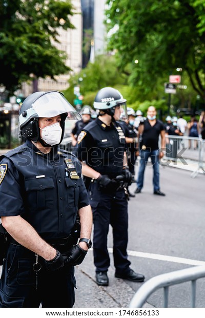 New York City, New York / USA - June 2 2020.\
Protests and looting in New York. Looting and rioting protests New\
York City over George Floy death. Police and protesters in\
Manhattan. Police\
brutality.