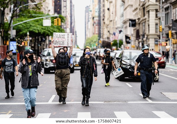 New York City, New York / USA - June 18 2020.\
Protests and looting in New York. Looting and rioting protests New\
York City over George Floy death. Police and protesters in\
Manhattan. Police\
brutality.