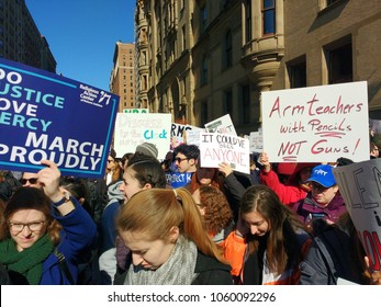 New York City, New York / USA - March 24 2018: Demonstrators on West 72nd Street, near The Dakota, during the March for Our Lives in New York City.