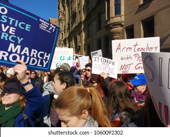 New York City, New York / USA - March 24 2018: Demonstrators on West 72nd Street, near The Dakota, during the March for Our Lives in New York City.