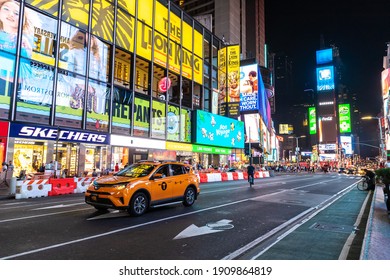 NEW YORK CITY, USA - MARCH 15, 2020: Times Square at night is a symbol of New York City, USA