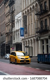 New York City, New York / USA - Match 29 2020:
Single Car Standing On The Parking Spot Parallel Parking On New York Street In Soho Area, Yellow Cab During On New York Streets During Pandemic Outbreak 