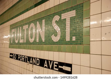 New York City, USA - May 22 2015: Colorful Tiles Of Fulton Street Station Sign At New York Metro