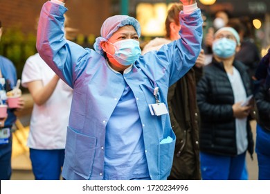 New York City, New York / USA - May 2 2020: New York American nurses and doctors, frontline workers expressing gratitude. New York City healthcare workers during coronavirus outbreak in America.