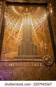 New York City, USA – May 8, 2017. Aluminum Relief Of The Empire State Building, At The West End Of The Building’s Lobby, Behind The Security Desk. 